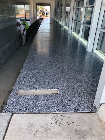 Flake epoxy coating on an exterior covered breezeway in Naples, FL