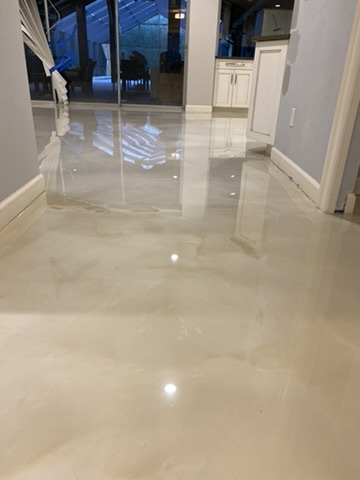 Pearl metallic epoxy floor in a residential hallway in Naples, FL